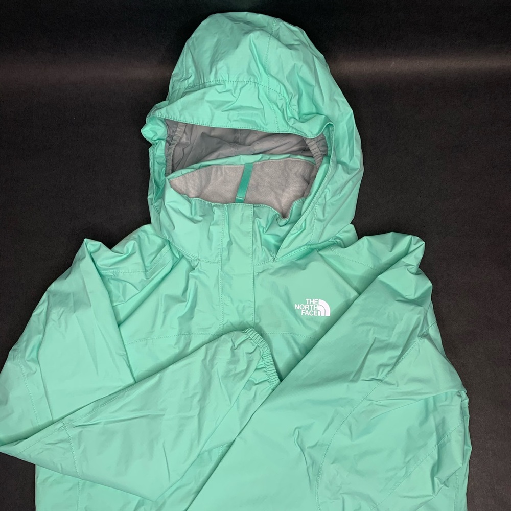 North face teal women’s wind breaker